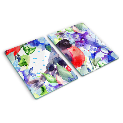 Glas-Schneidebrett mit einem Motiv eines Vogels vor einem Blumenhintergrund