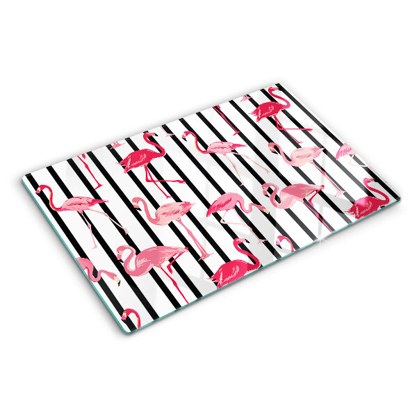 Glas-Schneidebrett mit Flamingos auf gestreiftem Hintergrund