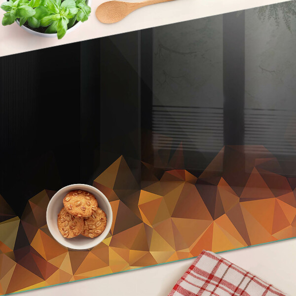 Glas-Schneidebrett mit einem Motiv brennendes Lagerfeuer im geometrischen Stil