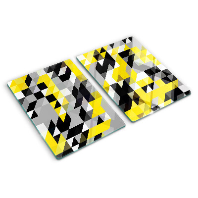 Glas-Schneidebrett mit geometrischem Muster in Gelb- und Schwarztönen