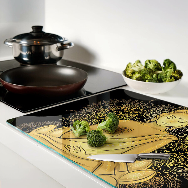 Schneidebrett mit Motiv einer Buddha-Figur in Meditationshaltung