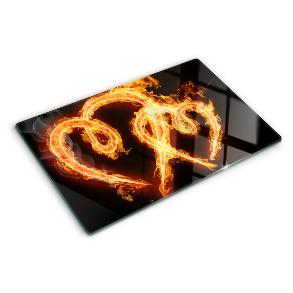 Schneidebrett mit Motiv eines brennenden Herzens