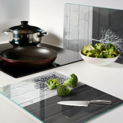 Schneidebrett glas Ein Baum vor einem Backsteinhintergrund
