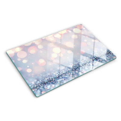 Glas-Schneidebrett mit funkelnden Lichtern und Diamantakzent
