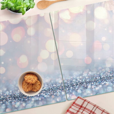 Glas-Schneidebrett mit funkelnden Lichtern und Diamantakzent