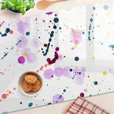 Schneidebrett mit abstraktem Farbspritzermotiv