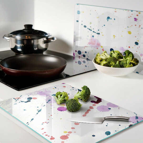 Schneidebrett mit abstraktem Farbspritzermotiv