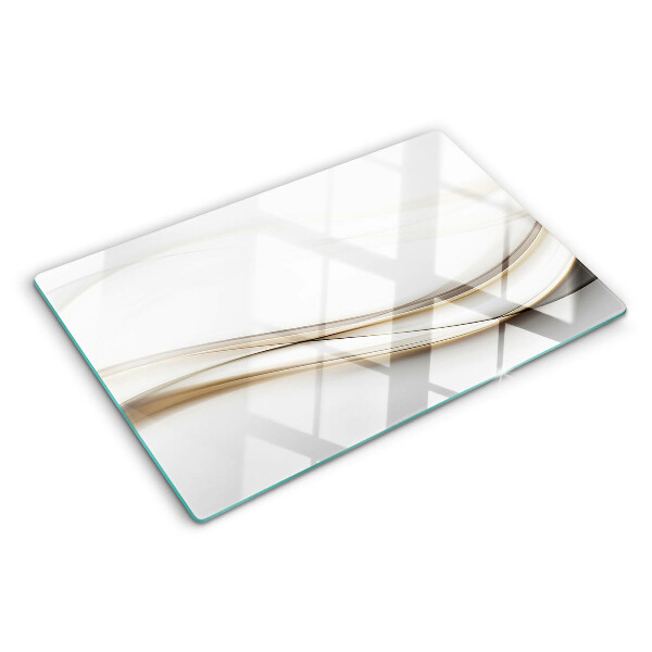 Glas-Schneidebrett mit abstrakten Wellen in Beigetönen