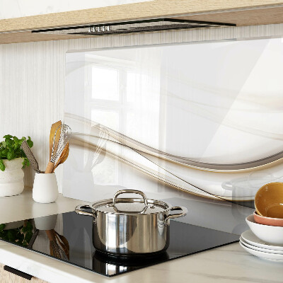 Glas-Schneidebrett mit abstrakten Wellen in Beigetönen