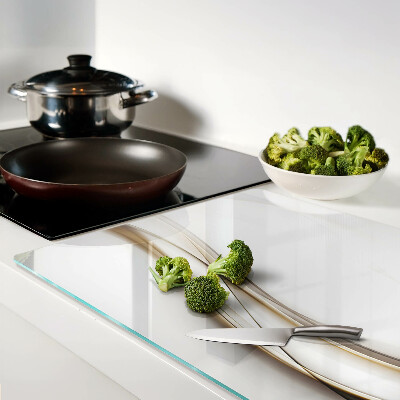 Glas-Schneidebrett mit abstrakten Wellen in Beigetönen