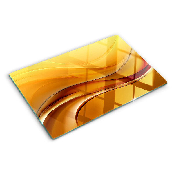 Glas Schneidebrett mit Wellen in Goldtönen