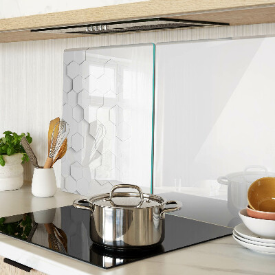 Schneidebrett mit einem Muster aus Sechsecken in Grautönen