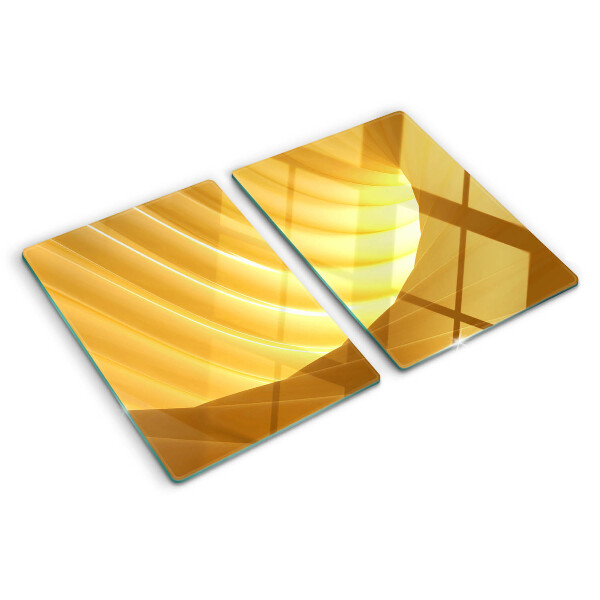 Schneidebrett mit goldenen Wellen und Fensterdekoration