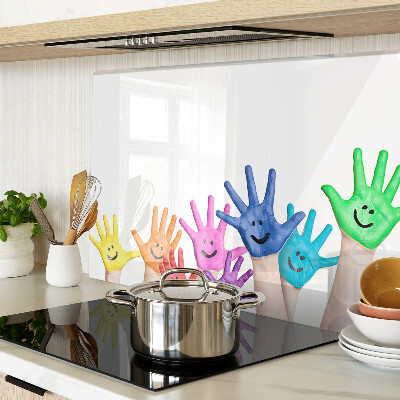 Glas Schneidebrett mit bunten, lächelnden Händen als Motiv