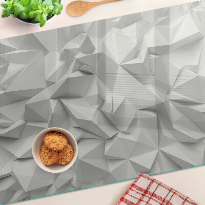 Glas-Schneidebrett mit abstraktem 3D-Muster in Grautönen