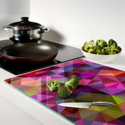 Schneidebrett Glas mit geometrischem Muster in Rosa- und Lilatönen