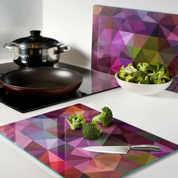 Schneidebrett Glas mit geometrischem Muster in Rosa- und Lilatönen