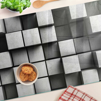 Glas-Schneidebrett mit geometrischem Muster in Grautönen