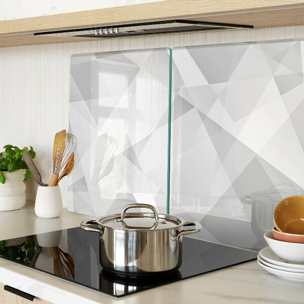 Schneidebrett mit geometrischem Motiv in Grautönen