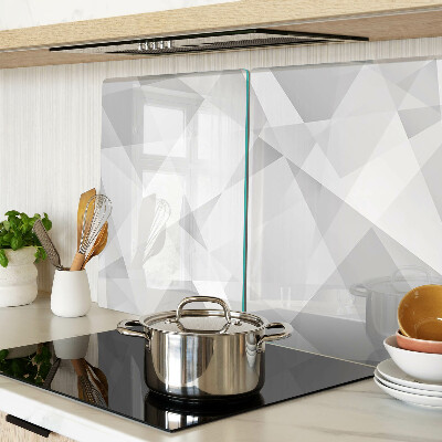 Schneidebrett mit geometrischem Motiv in Grautönen