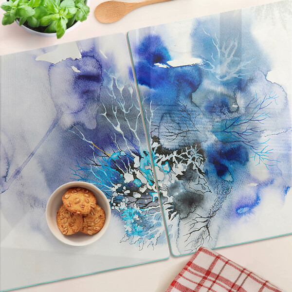 Glas-Schneidebrett mit abstraktem blauem Muster