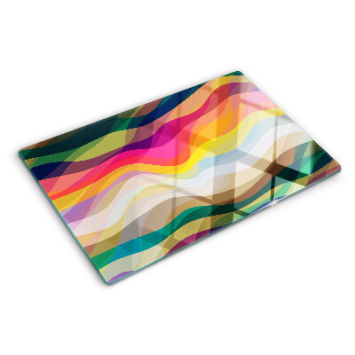 Glas-Schneidebrett mit abstrakten Farbwellen als Motiv