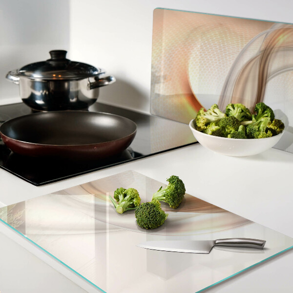 Glas Schneidebrett mit Lichtwellen in Goldtönen