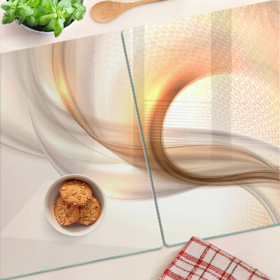 Glas Schneidebrett mit Lichtwellen in Goldtönen