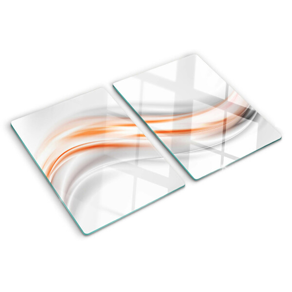 Schneidebrett mit Wellenmuster in Orange- und Grautönen