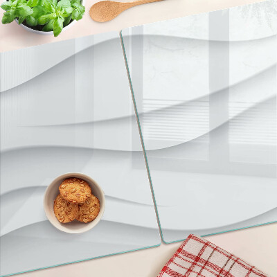 Schneidebrett mit wellen- und linienförmiger Struktur