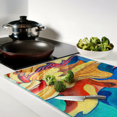 Schneidebrett Glas mit bunten Blumen auf abstraktem Hintergrund