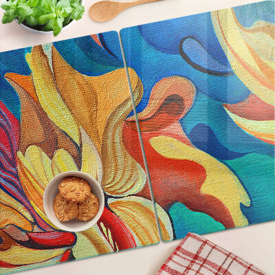 Schneidebrett Glas mit bunten Blumen auf abstraktem Hintergrund