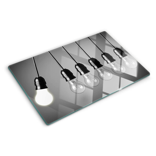 Schneidebrett Glühbirnen an Kabeln