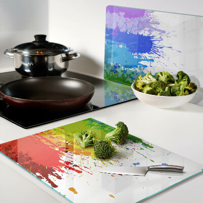 Schneidebrett Glas mit bunten Farbflecken