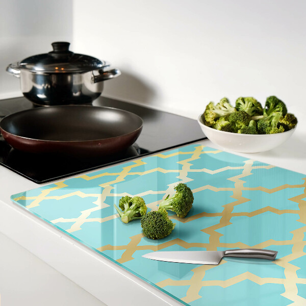 Glas-Schneidebrett mit Arabeskenmotiv in Blautönen