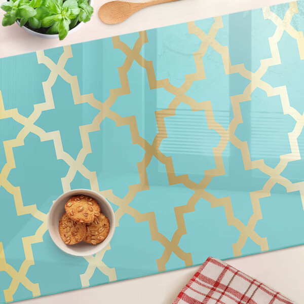 Glas-Schneidebrett mit Arabeskenmotiv in Blautönen