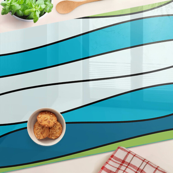 Schneidebrett mit Wellenmuster in Blau- und Grüntönen