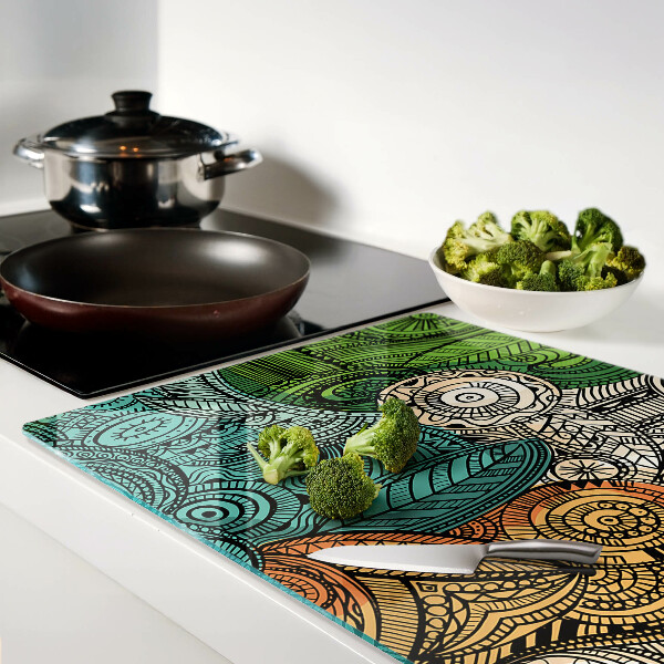 Schneidebrett Glas mit Mandala-Motiv und farbenfrohen Mustern