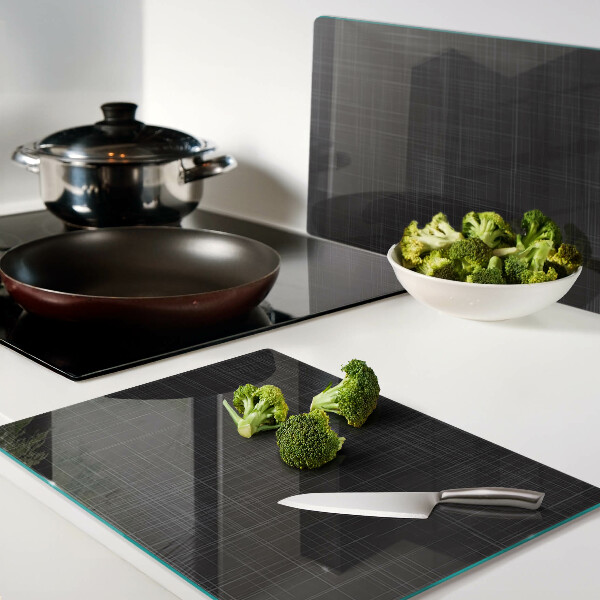 Glas-Schneidebrett mit geometrischem Linien- und Schattendesign