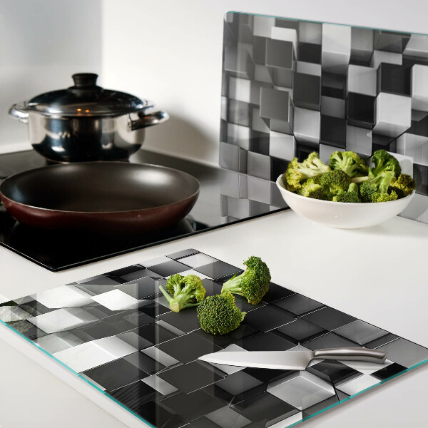 Glas-Schneidebrett mit Schachbrettmuster in Schwarz- und Weißtönen
