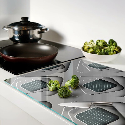 Schneidebrett mit geometrischem Muster in Grautönen