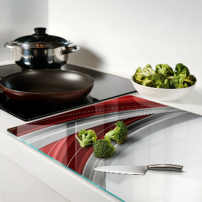 Schneidebrett mit abstrakten Wellen in Rot und Grau