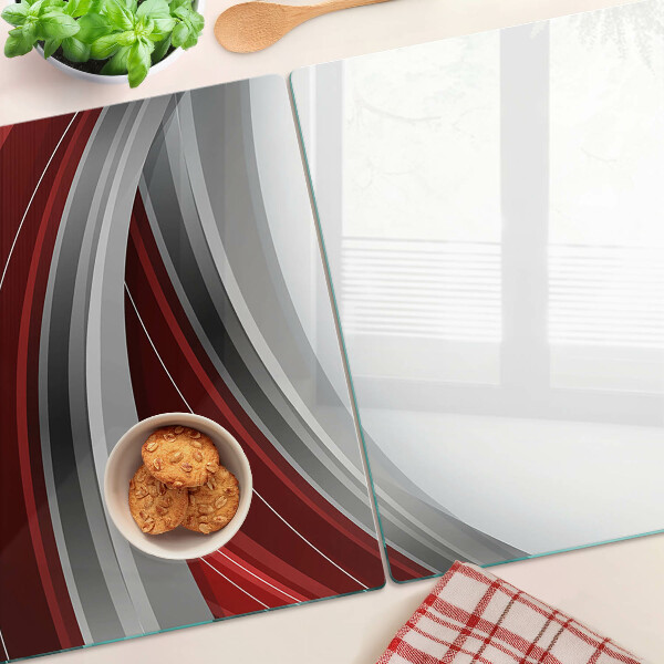 Schneidebrett mit abstrakten Wellen in Rot und Grau