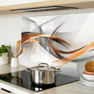 Schneidebrett Glas mit abstraktem Wellenmuster in Goldtönen