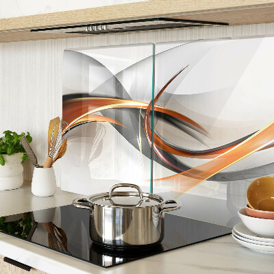 Schneidebrett Glas mit abstraktem Wellenmuster in Goldtönen