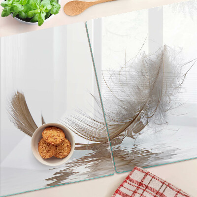 Schneidebrett glas Eine Feder gegen das Wasser