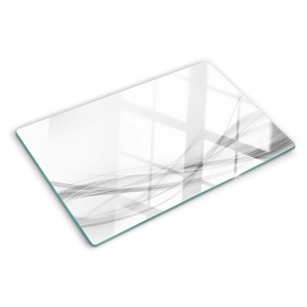 Schneidebrett Glas mit abstrakten Linien- und Wellenmotiven