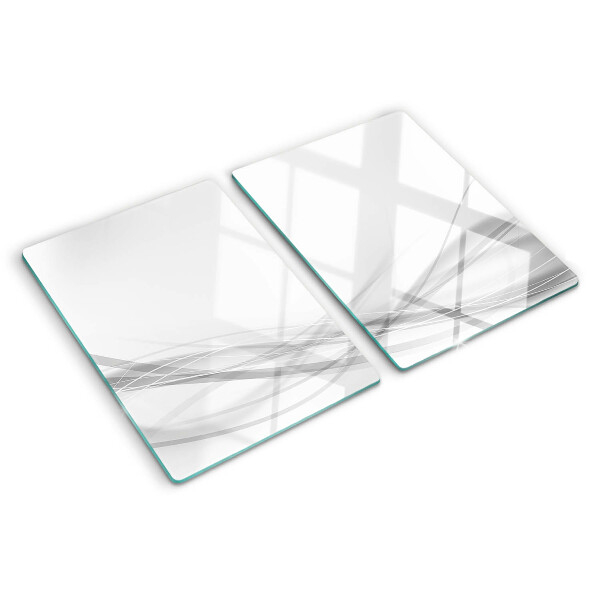 Schneidebrett Glas mit abstrakten Linien- und Wellenmotiven