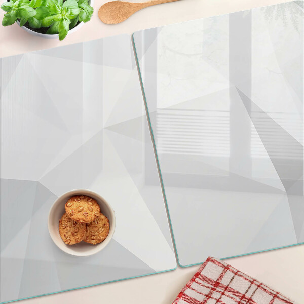 Glas-Schneidebrett mit geometrischem Muster in Grautönen