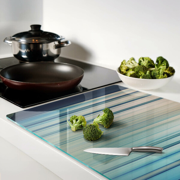 Glas Schneidebrett mit abstrakten Linien in Blautönen